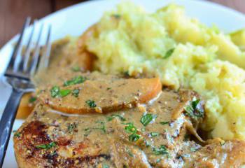 Pork Loins With A Mustard And Apple Sauce On Bubble And Squeak Mash