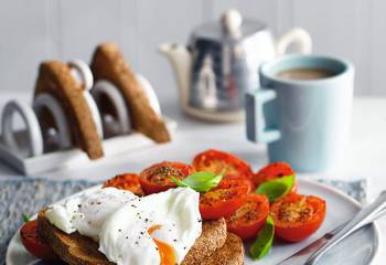 Poached Eggs And Tomatoes On Toast